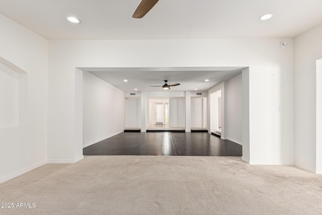 carpeted empty room with ceiling fan