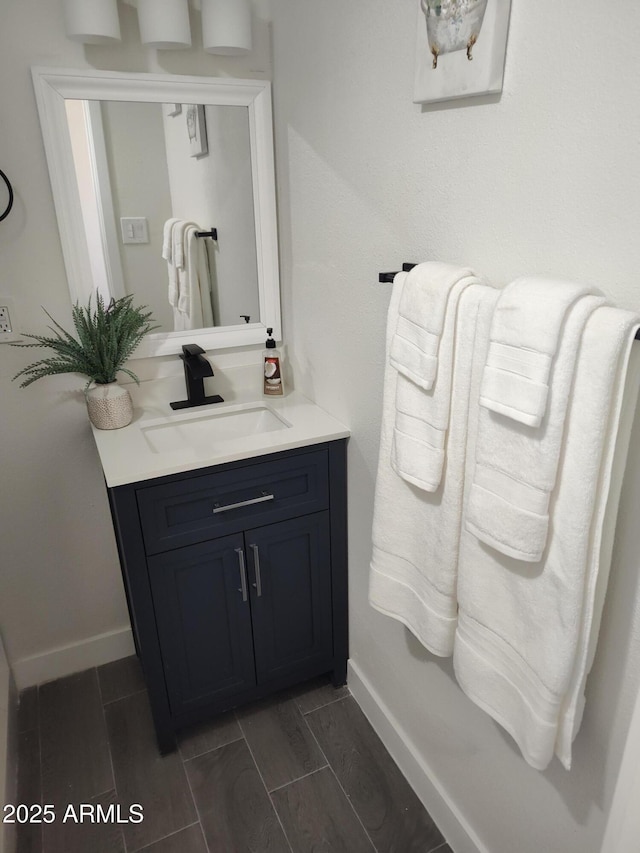 309 W Az Highway 177, Winkelman, AZ 85192 - bathroom featuring baseboards and vanity