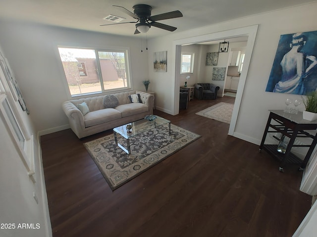 309 W Az Highway 177, Winkelman, AZ 85192 - living area with a ceiling fan, dark wood-style flooring, healthy amount of natural light, and baseboards