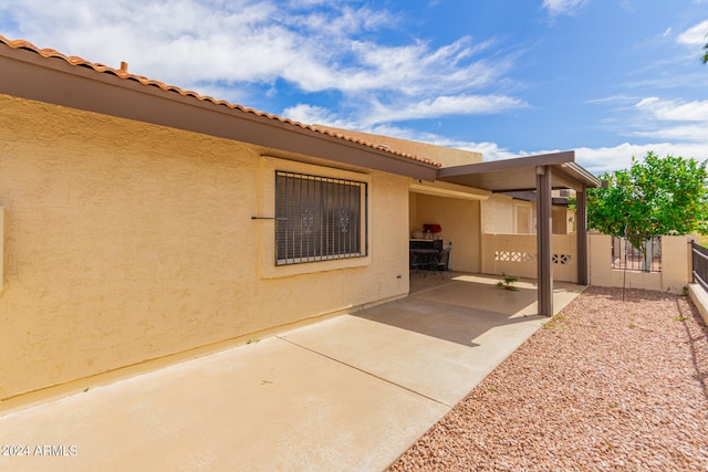 rear view of property with a patio