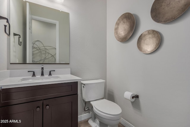 14571 W Wethersfield Rd, Surprise, AZ 85379 - half bath with toilet, baseboards, and vanity