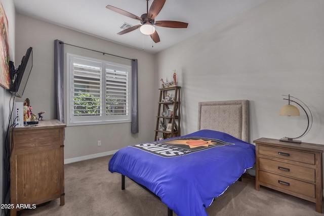 14571 W Wethersfield Rd, Surprise, AZ 85379 - carpeted bedroom with baseboards and ceiling fan