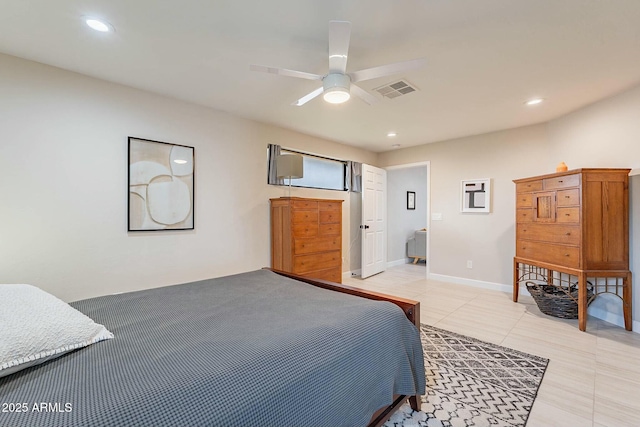 bedroom with ceiling fan and light tile patterned flooring