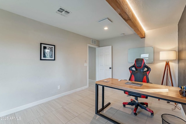 office space featuring beam ceiling