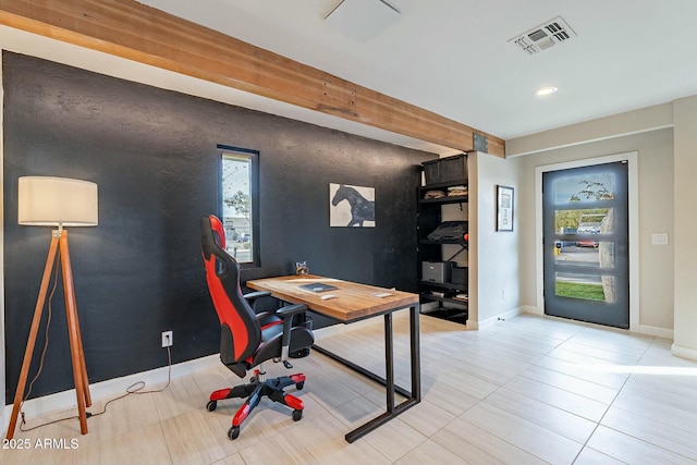 office with beamed ceiling and light tile patterned flooring