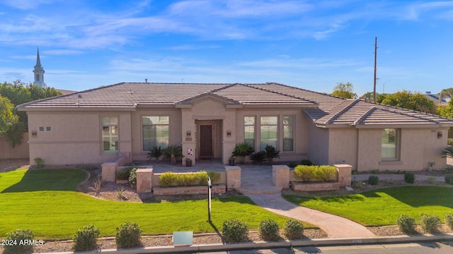 view of front of house with a front yard