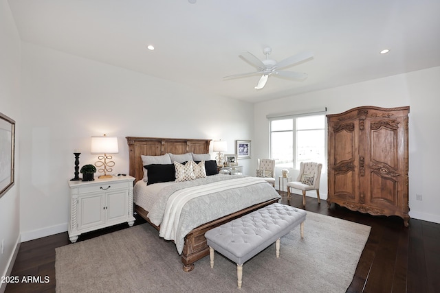 bedroom with recessed lighting, dark wood-type flooring, baseboards, and ceiling fan