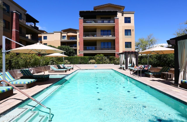 pool with a patio area