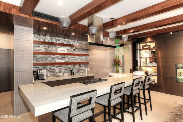 bar with ventilation hood, beam ceiling, gas stovetop, indoor wet bar, and decorative backsplash