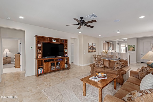 living room featuring ceiling fan