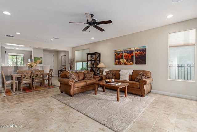 living room featuring ceiling fan