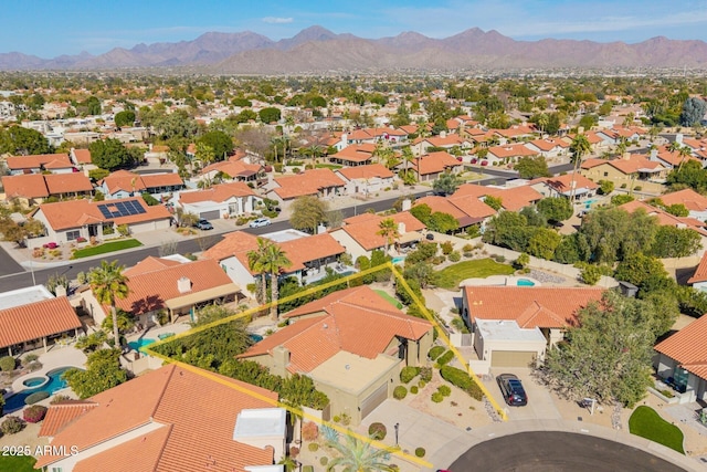 drone / aerial view featuring a mountain view