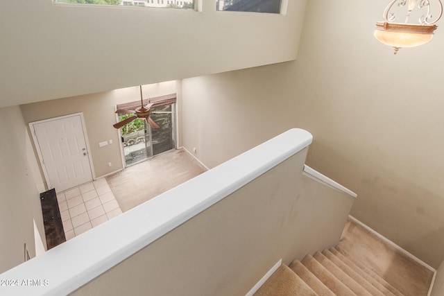 staircase with tile patterned flooring