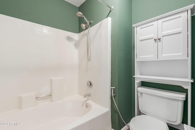 bathroom featuring toilet and shower / bathing tub combination