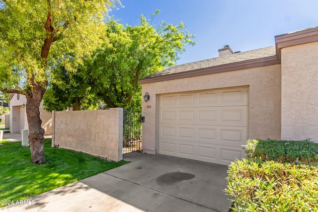 garage with a yard