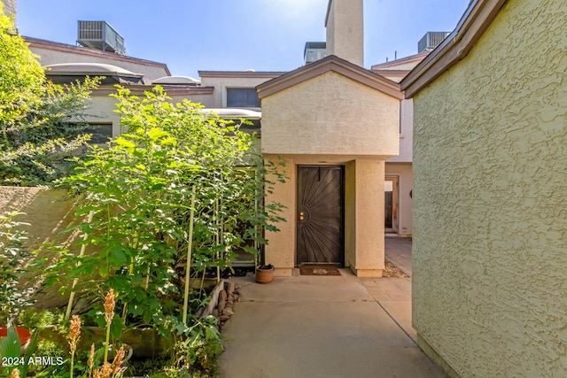 doorway to property featuring a patio