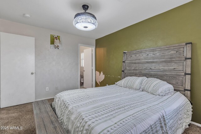 bedroom featuring baseboards and carpet floors