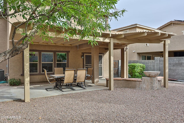 view of patio with central air condition unit, outdoor dining area, fence, and a pergola