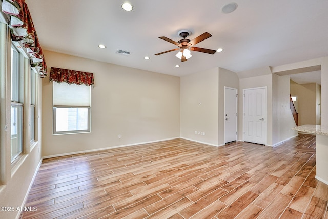 spare room with visible vents, baseboards, ceiling fan, recessed lighting, and light wood-style floors