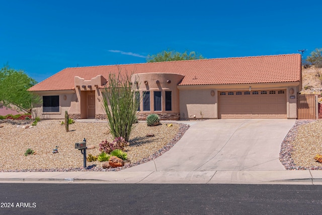 view of front of property with a garage