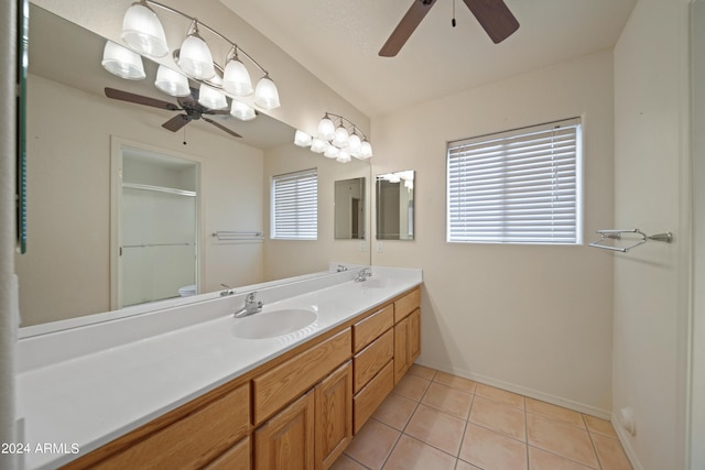 bathroom with an enclosed shower, vanity, tile patterned floors, and ceiling fan