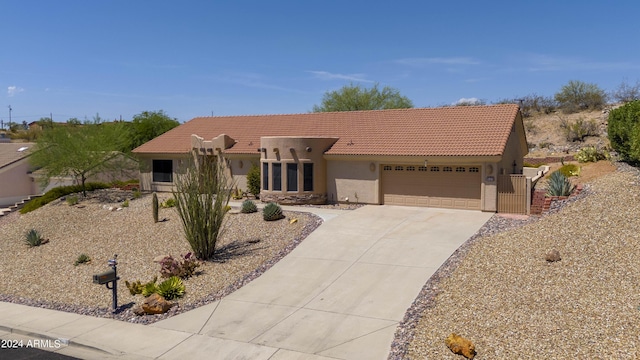 view of front of home with a garage