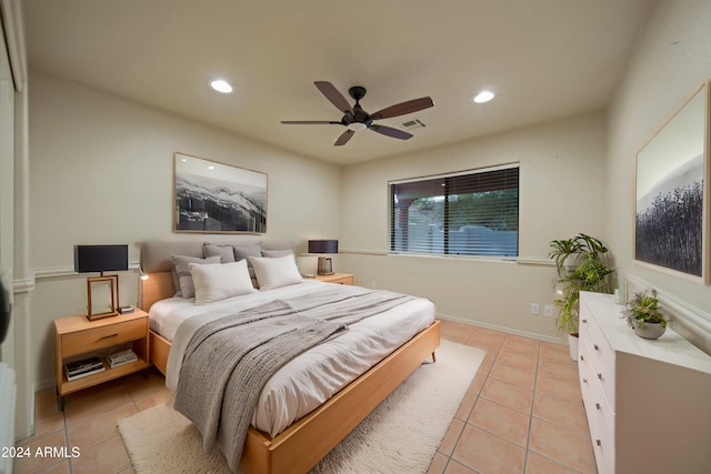 bedroom with light tile patterned floors and ceiling fan