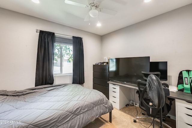 carpeted bedroom featuring ceiling fan