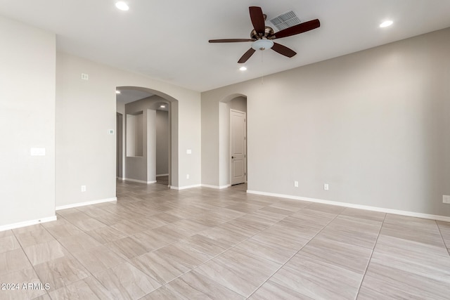 unfurnished room featuring ceiling fan