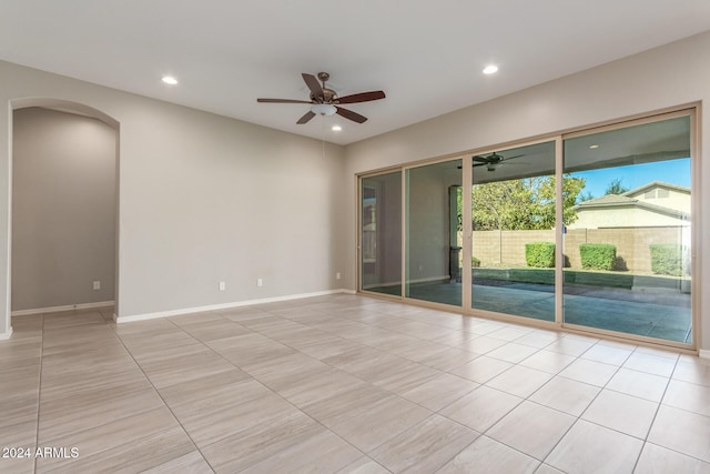 unfurnished room featuring ceiling fan