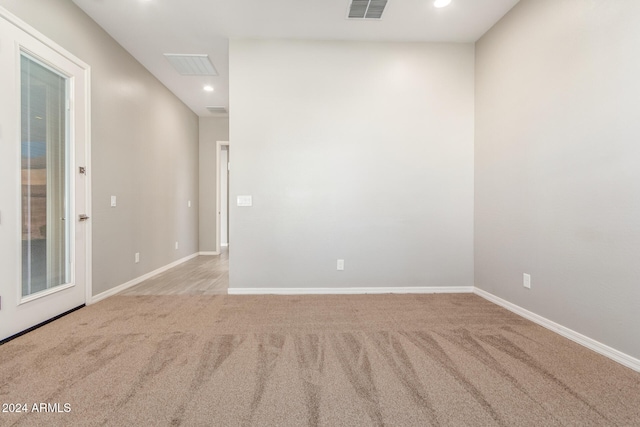 view of carpeted spare room