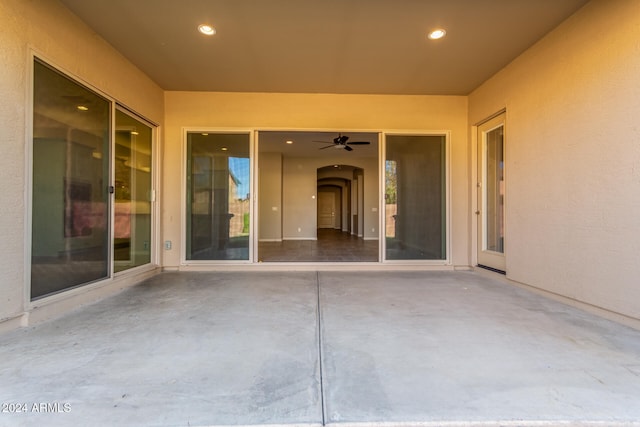 view of patio / terrace featuring ceiling fan