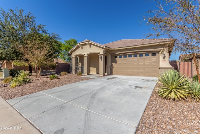 view of front of home with a garage