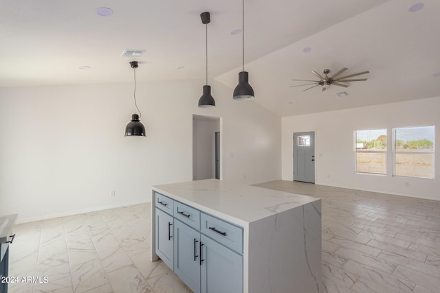 kitchen with a kitchen island, vaulted ceiling, light stone countertops, decorative light fixtures, and ceiling fan