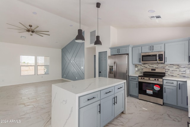 kitchen with a kitchen island, stainless steel appliances, light stone countertops, pendant lighting, and tasteful backsplash