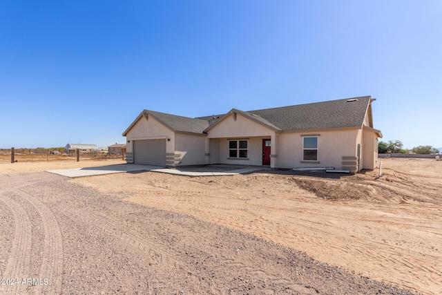 ranch-style house with a garage