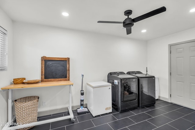 laundry room with dark tile patterned floors, a ceiling fan, washer and dryer, recessed lighting, and laundry area