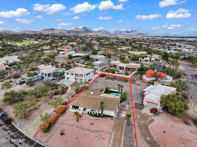 bird's eye view featuring a residential view and a mountain view