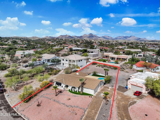 aerial view with a residential view and a mountain view