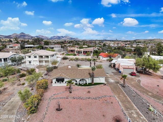 birds eye view of property with a residential view and a mountain view