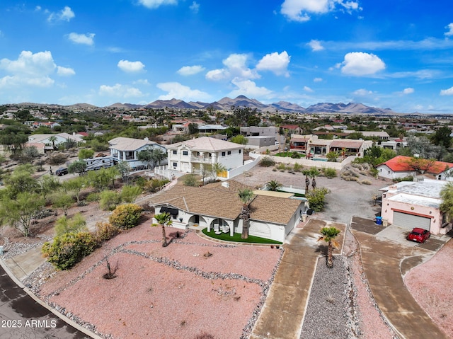 aerial view with a mountain view and a residential view