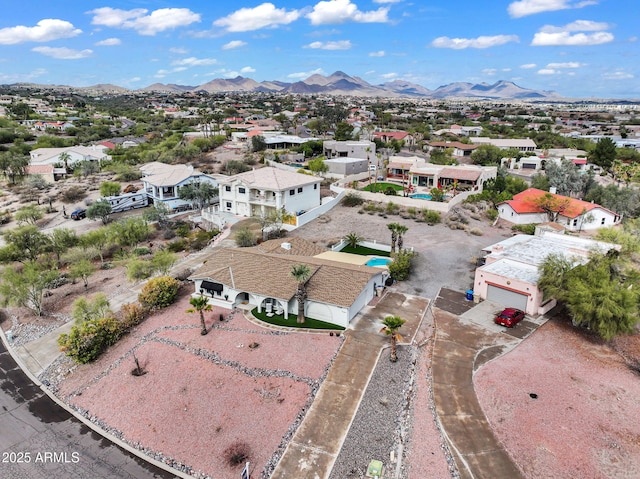 aerial view with a mountain view and a residential view