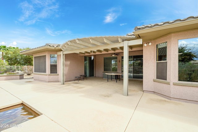 view of patio / terrace featuring fence and a pergola