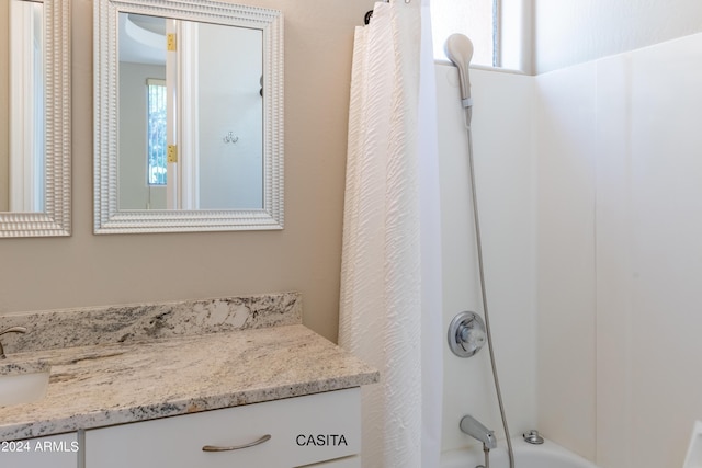 15972 N 115th Way, Scottsdale, AZ 85255 - full bath featuring healthy amount of natural light, vanity, and shower / bathtub combination with curtain