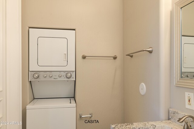 15972 N 115th Way, Scottsdale, AZ 85255 - laundry room with stacked washer and clothes dryer