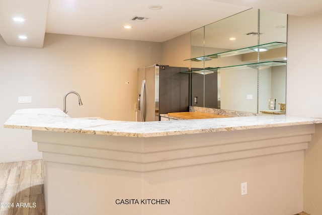 15972 N 115th Way, Scottsdale, AZ 85255 - bathroom featuring a sink, wood finished floors, and recessed lighting