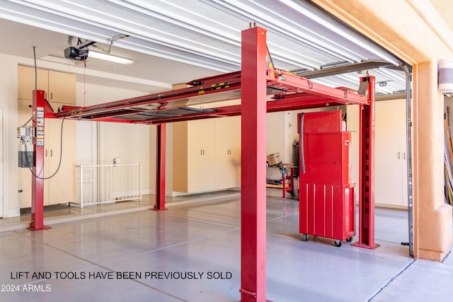 15972 N 115th Way, Scottsdale, AZ 85255 - garage featuring a garage door opener