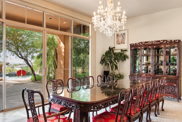 15972 N 115th Way, Scottsdale, AZ 85255 - tiled dining area with plenty of natural light and a chandelier
