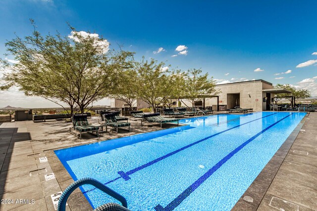 pool with a patio area