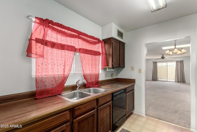 kitchen featuring sink, dark brown cabinets, dishwasher, pendant lighting, and ceiling fan